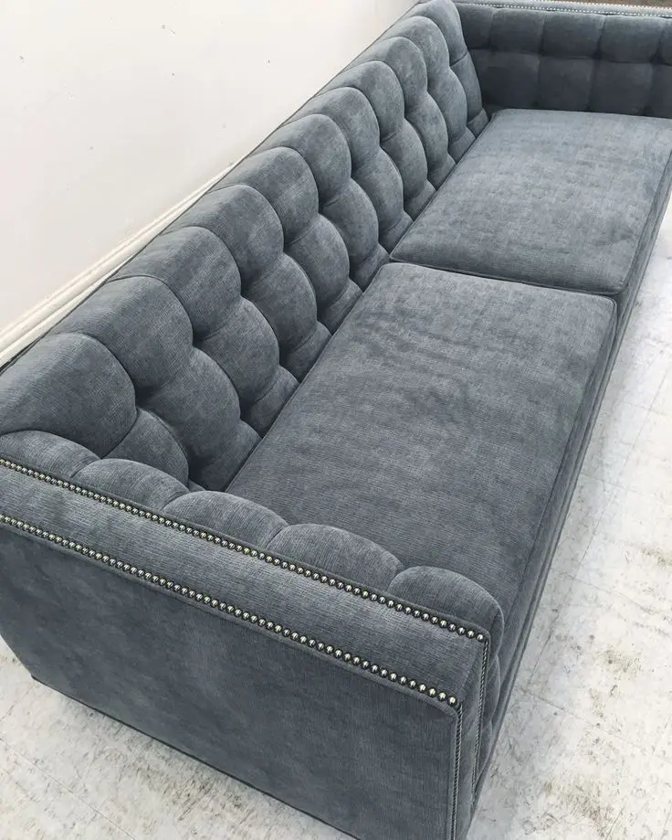 Deep-button tufted sofa
